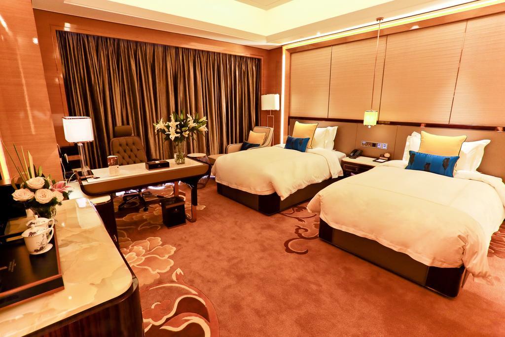 Jinjiang International Hotel Урумчі Номер фото